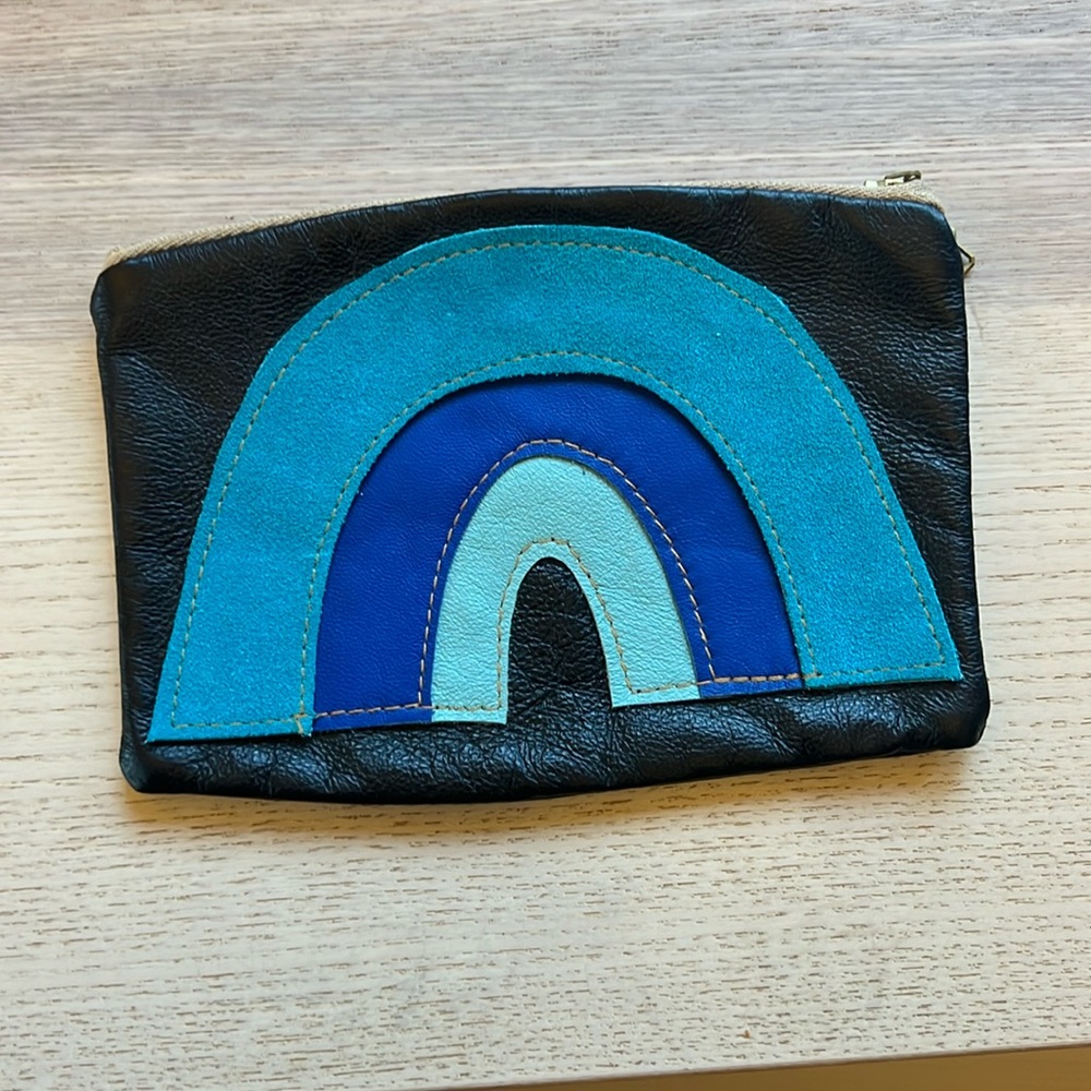 Leather pouch wallet with blue rainbow design